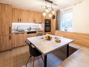 Fridge, microwave, cookware/dishes/utensils