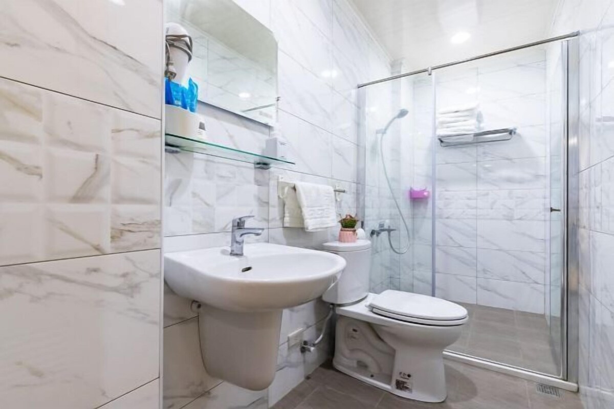 Bathroom | Shower, free toiletries, hair dryer, slippers