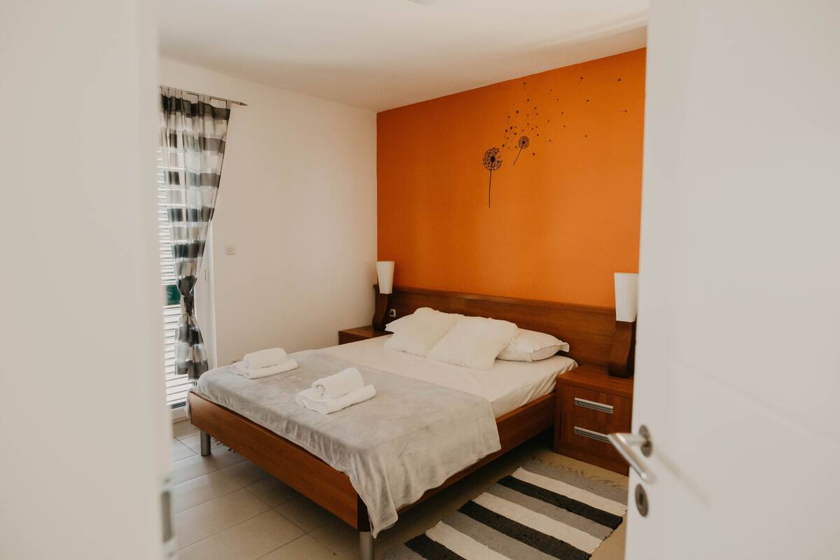 Premium bedding, memory foam beds, desk, laptop workspace