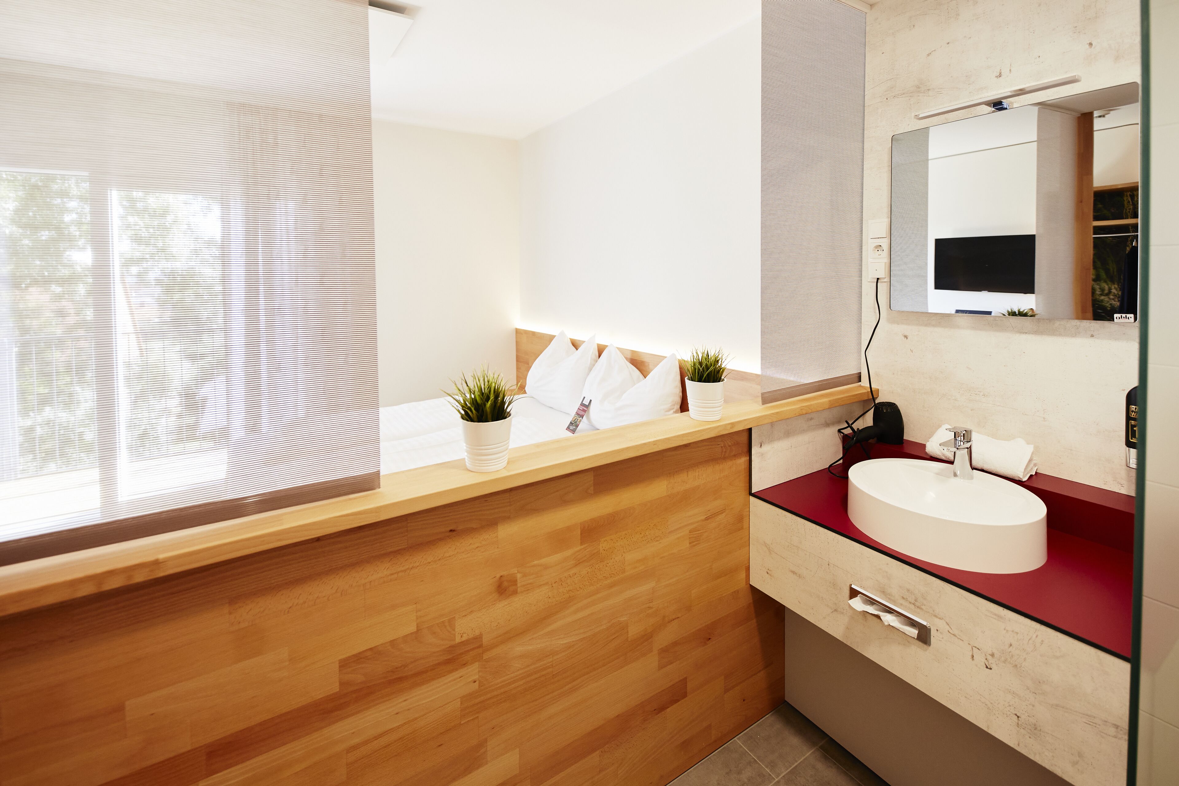 deluxe double room | bathroom | shower, free toiletries, hair dryer, towels