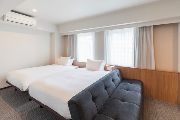 Deluxe Twin Room, Non Smoking | Desk, laptop workspace, iron/ironing board, free WiFi