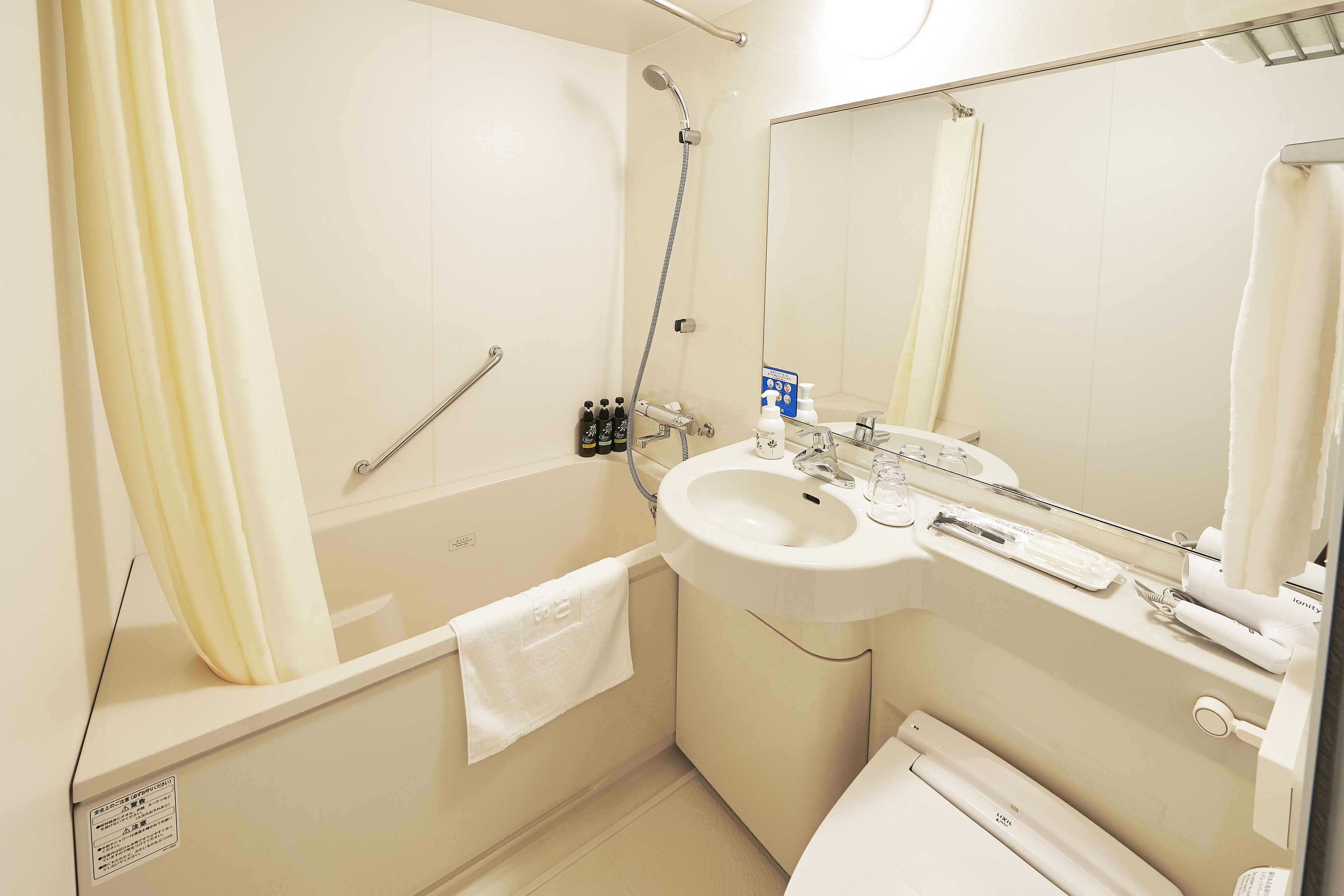 free toiletries, hair dryer, slippers, electronic bidet