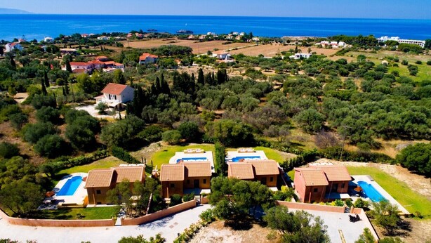 A coastal resort with multiple villas, each featuring a swimming pool and terraced gardens. - Sotiris Villas (Kefalonia)