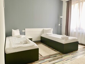 1 quarto, Wi-Fi de cortesia, roupa de cama