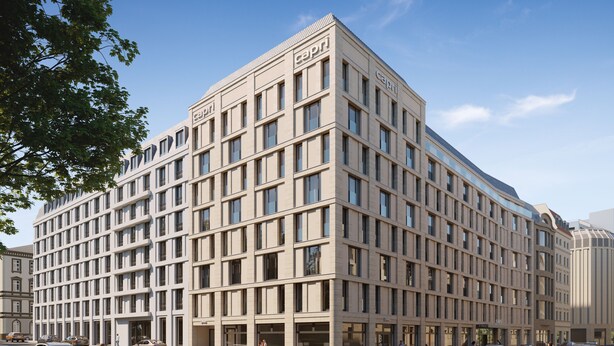 A modern multi-story building with a prominent 'Capri' sign, featuring a grid of windows and a flat roof. - Capri by Fraser Leipzig (Leipzig)
