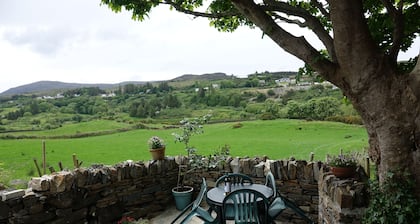 Secluded cottage in stunning mountain scenery near village