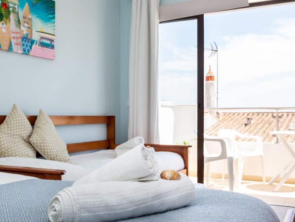 1 غرفة نوم ومكواة/لوح كي وواي فاي وملاءات أسرّة