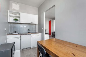 Fridge, microwave, stovetop, coffee/tea maker