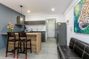 Fridge, microwave, coffee/tea maker, toaster