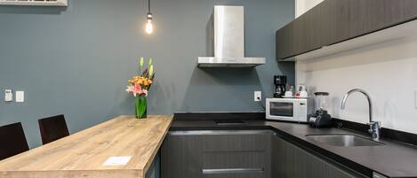 Fridge, microwave, coffee/tea maker, toaster