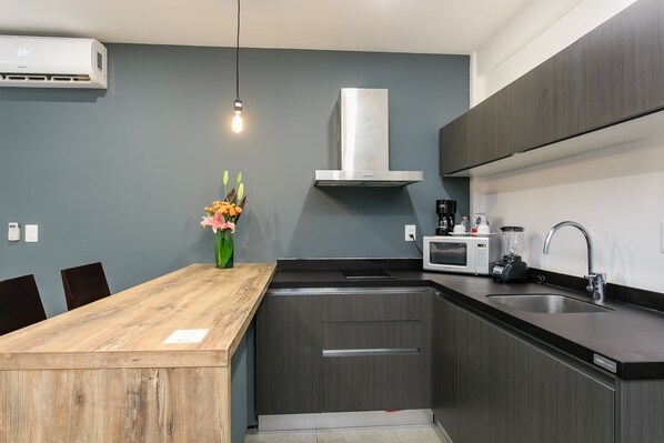 Fridge, microwave, coffee/tea maker, toaster