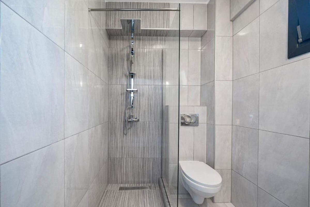 Bathroom | Shower, free toiletries, hair dryer, bathrobes