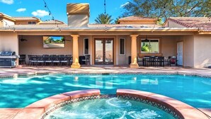 A swimming pool with a hot tub, outdoor seating, and a covered patio area. - HUGE LUX Estate, Pool/Spa, Pickleball, Sleeps 22!
Date Grove Near Palm Springs (Thousand Palms)