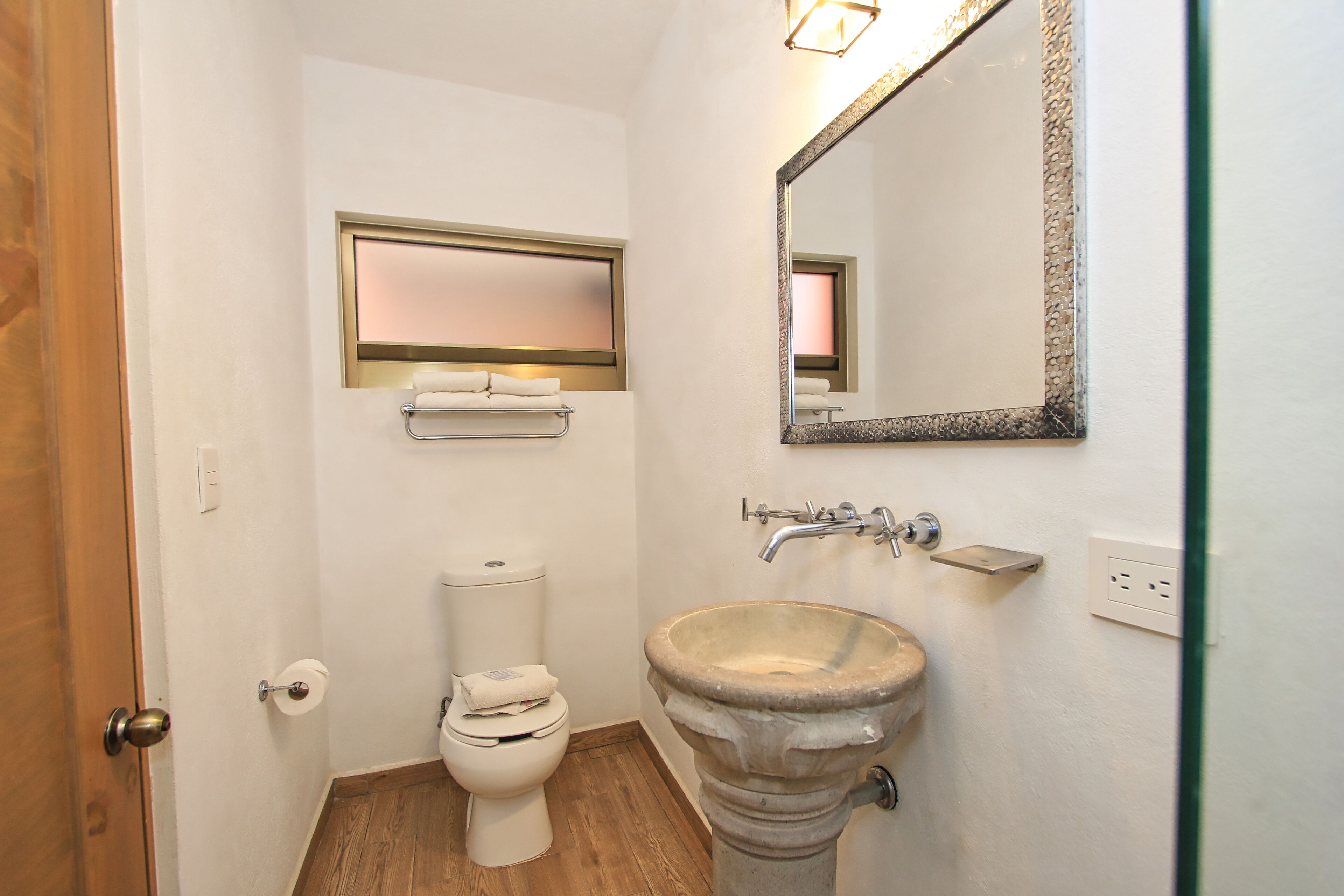 deluxe room | bathroom | shower, rainfall showerhead, hair dryer, towels