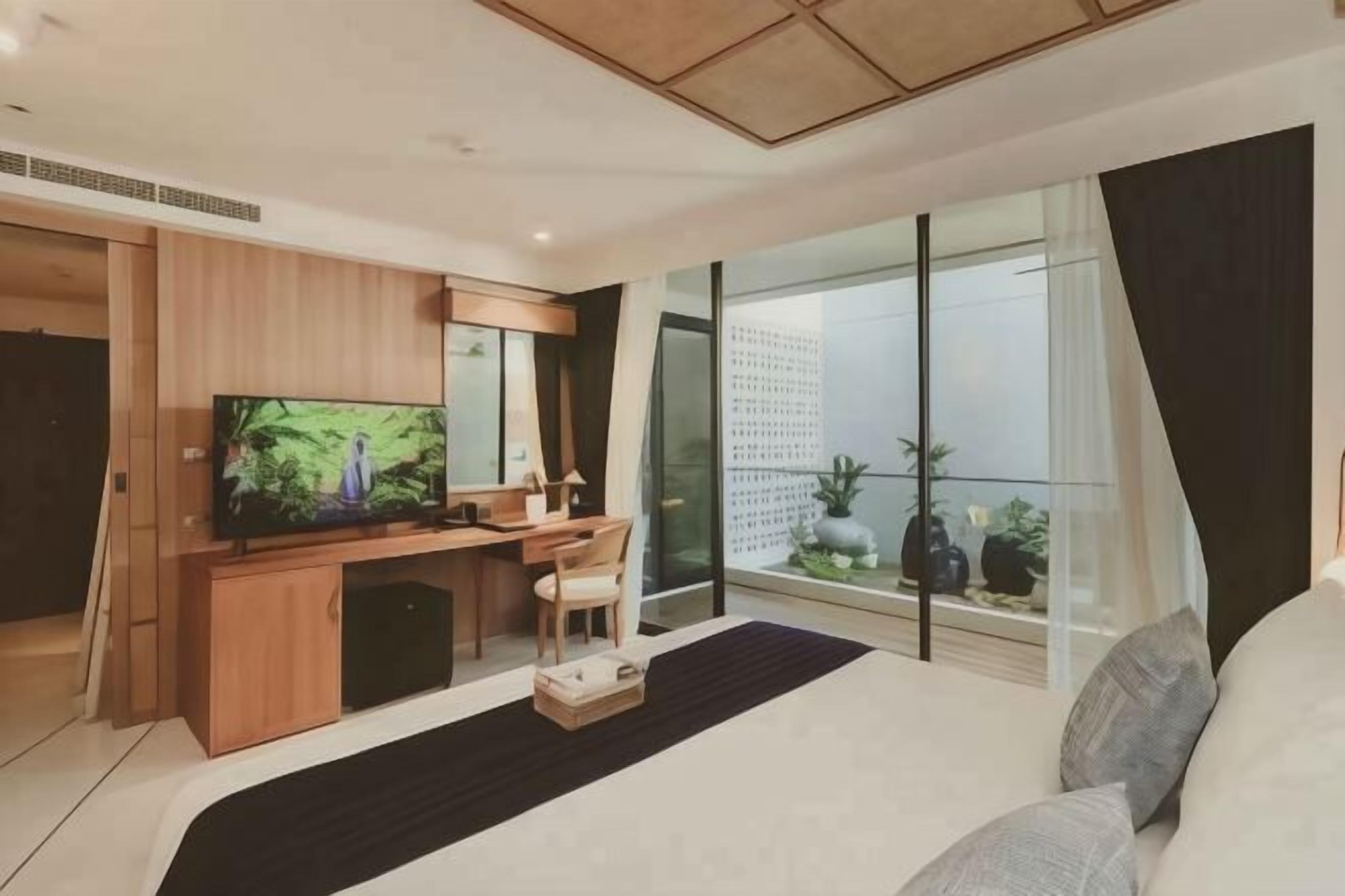Bộ đồ giường cao cấp, nệm có lớp đệm bông, minibar 