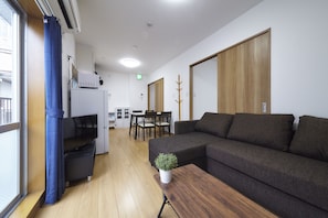 Appartement (402) | Coin séjour | Télévision à écran plat