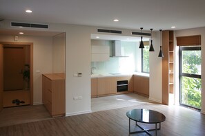 City Apartment, 2 Bedrooms | Living area | 40-inch Smart TV with cable channels, TV