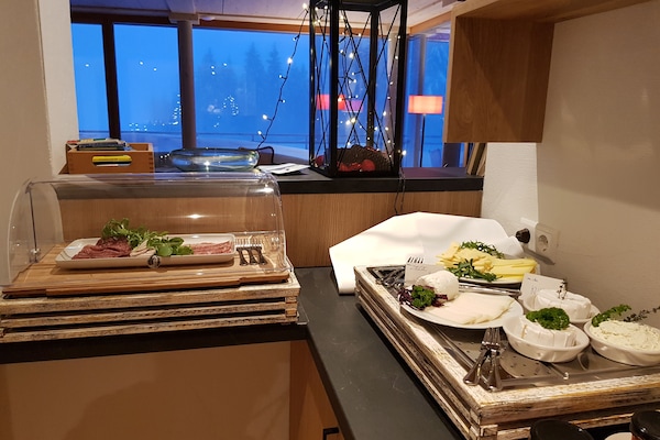 Daily buffet breakfast (EUR 18 per person)