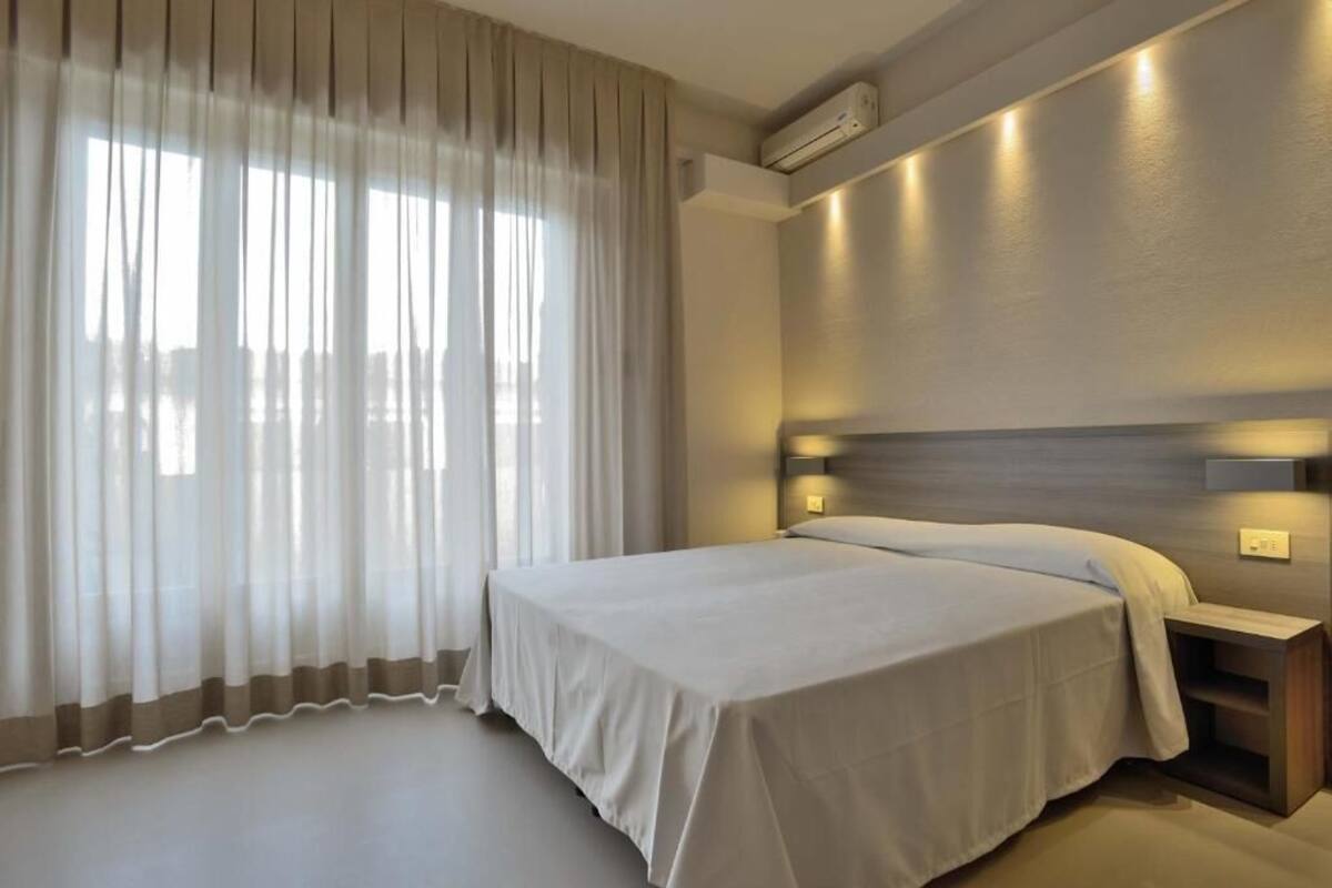 Down duvets, pillow-top beds, minibar, in-room safe