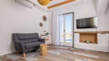 Hus Deluxe - 2 sovrum - privat pool - havsutsikt (Coral Villa) | Vardagsrum | Smart-tv
