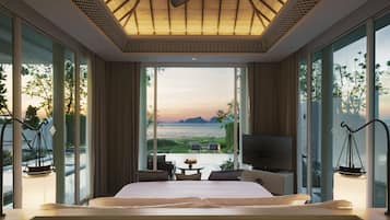 Two Bedroom Beachfront Pool Villa | Free minibar items, in-room safe, desk, laptop workspace