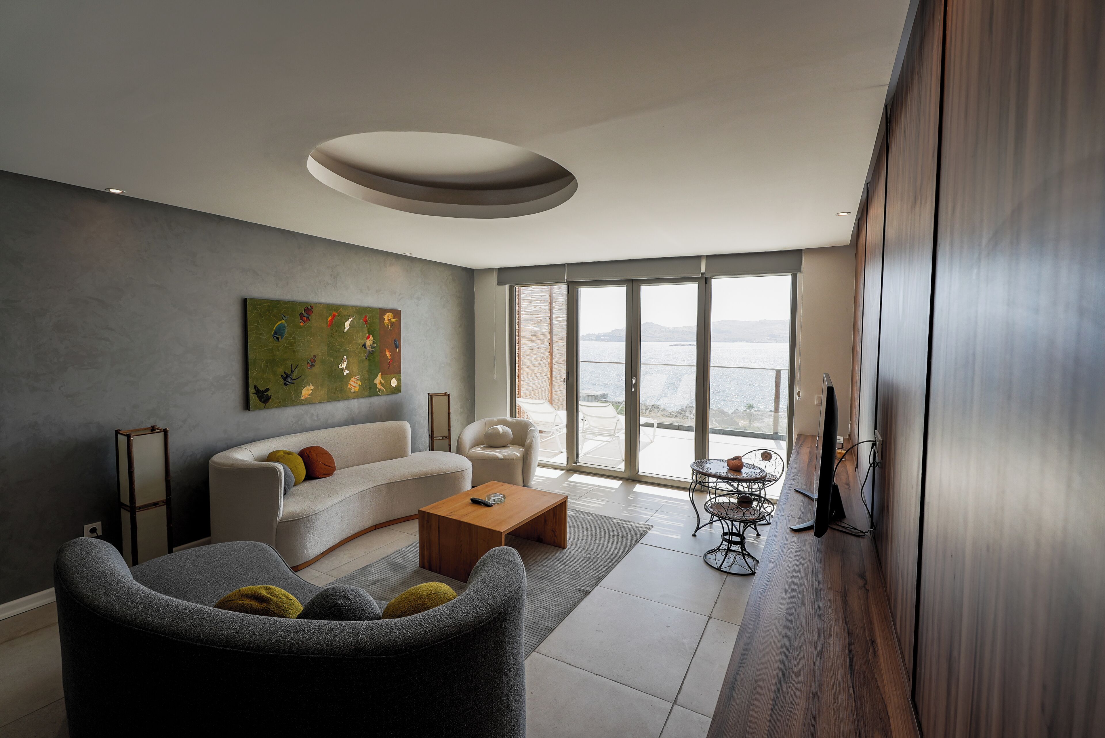 Suite Deluxe, 1 habitación, balcón, vista al mar | Televisión