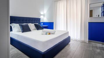 Apartment, 3 Bedrooms | 3 bedrooms, hypo-allergenic bedding, down comforters, blackout drapes