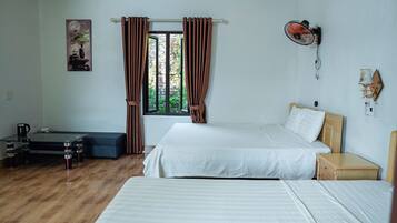 Family Quadruple Room | Desk, blackout drapes, free WiFi, bed sheets