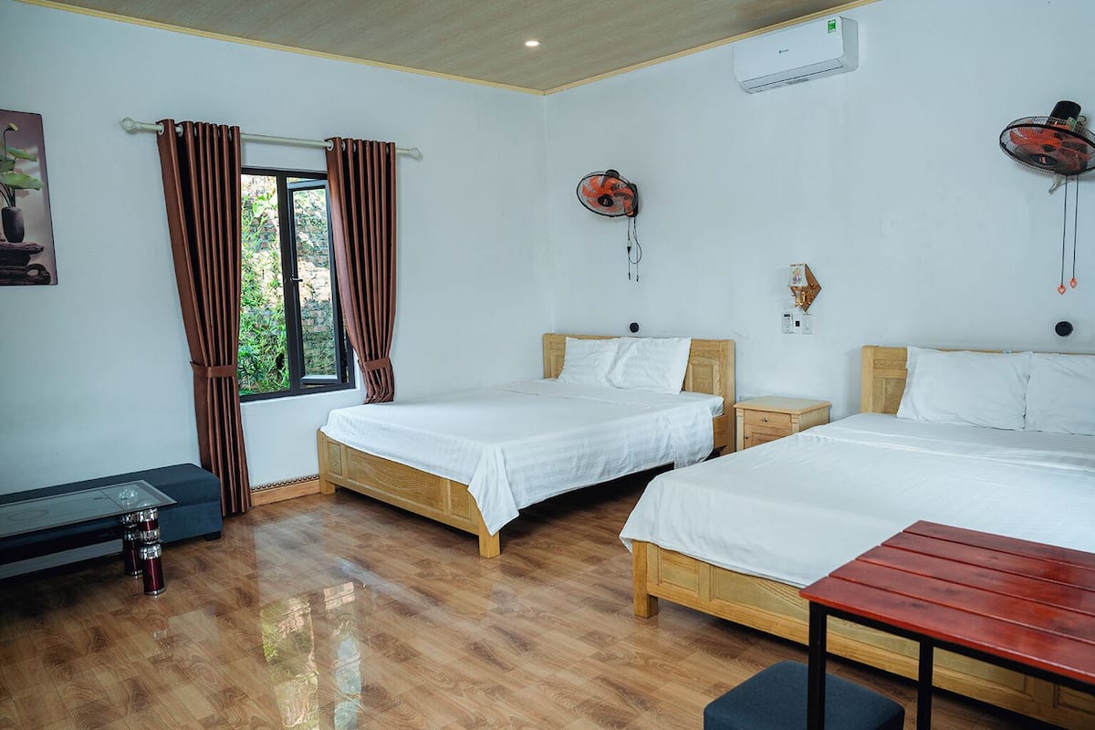 Family Quadruple Room | Desk, blackout drapes, free WiFi, bed sheets