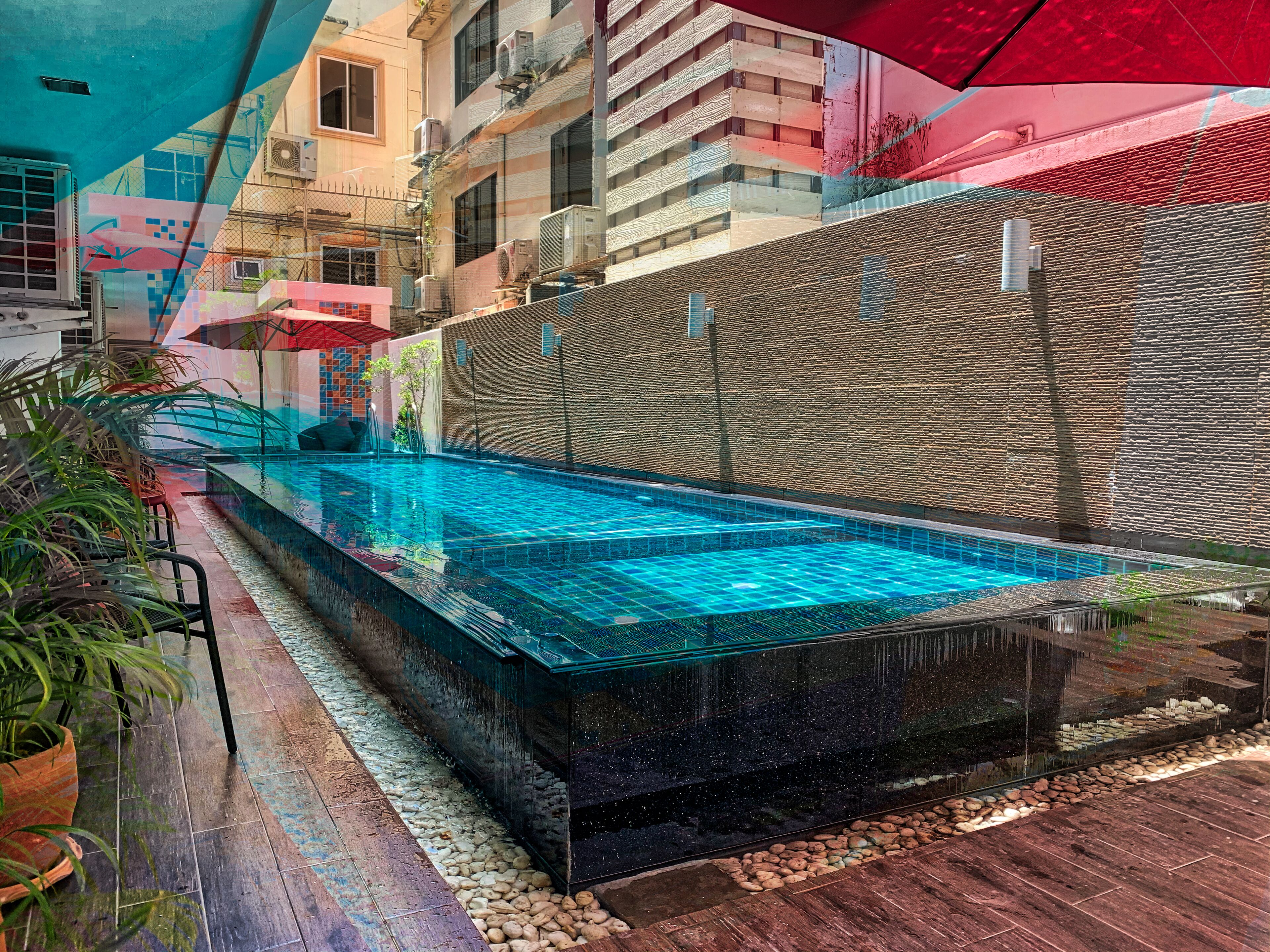 Outdoor pool, open 8:00 AM to 10:00 PM, pool loungers