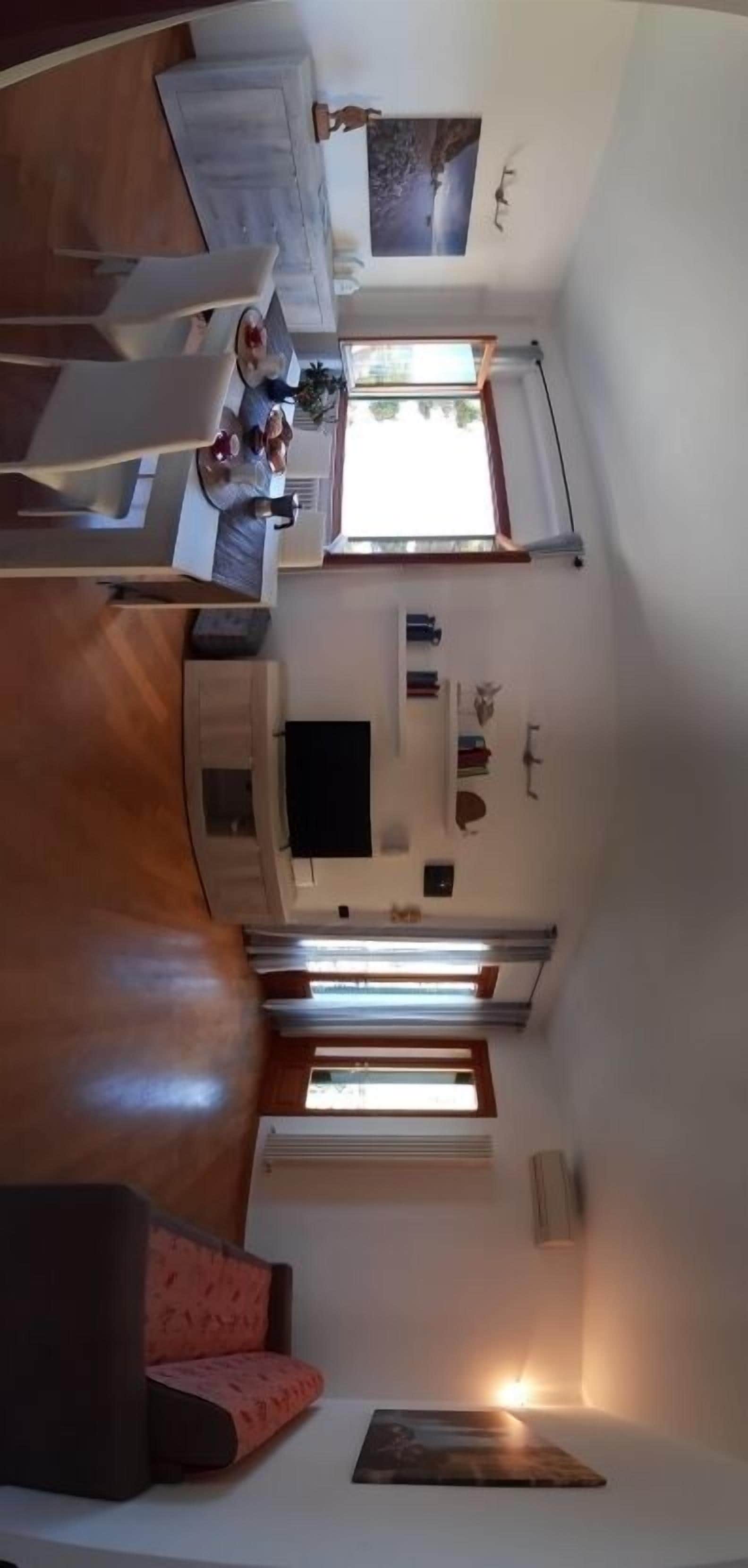 Apartamento, 1 quarto | Área de estar | TV de tela plana