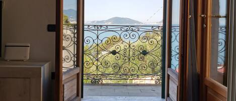 Apartment, 1 Bedroom | Living area | Flat-screen TV