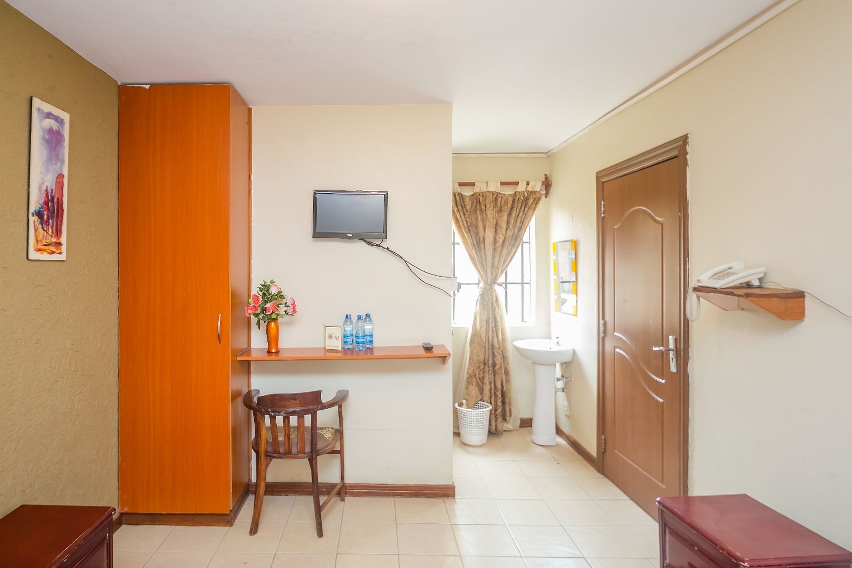 standard single room | living area | 32-inch flat-screen tv with satellite channels, tv