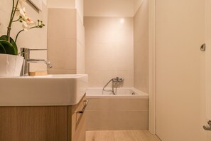 Superior Apartment, 2 Bedrooms, Terrace | Bathroom | Shower, bidet, towels, soap