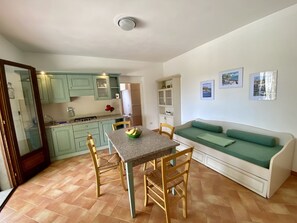 Apartment, 1 Bedroom (Sera&Mattino E) | Private kitchen | Full-size fridge, oven, stovetop, cookware/dishes/utensils - Sera&Mattino (Capoliveri)