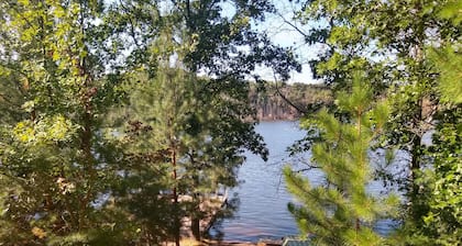 Swimming,boat,kayak,fish,BBQ,ATV,hike,Huge Deck,pets,Nordic MT- ski,tube,private