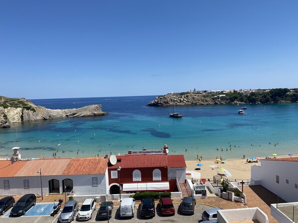 On the beach, sun-loungers, beach towels
