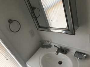 Shower, eco-friendly toiletries, hair dryer, towels