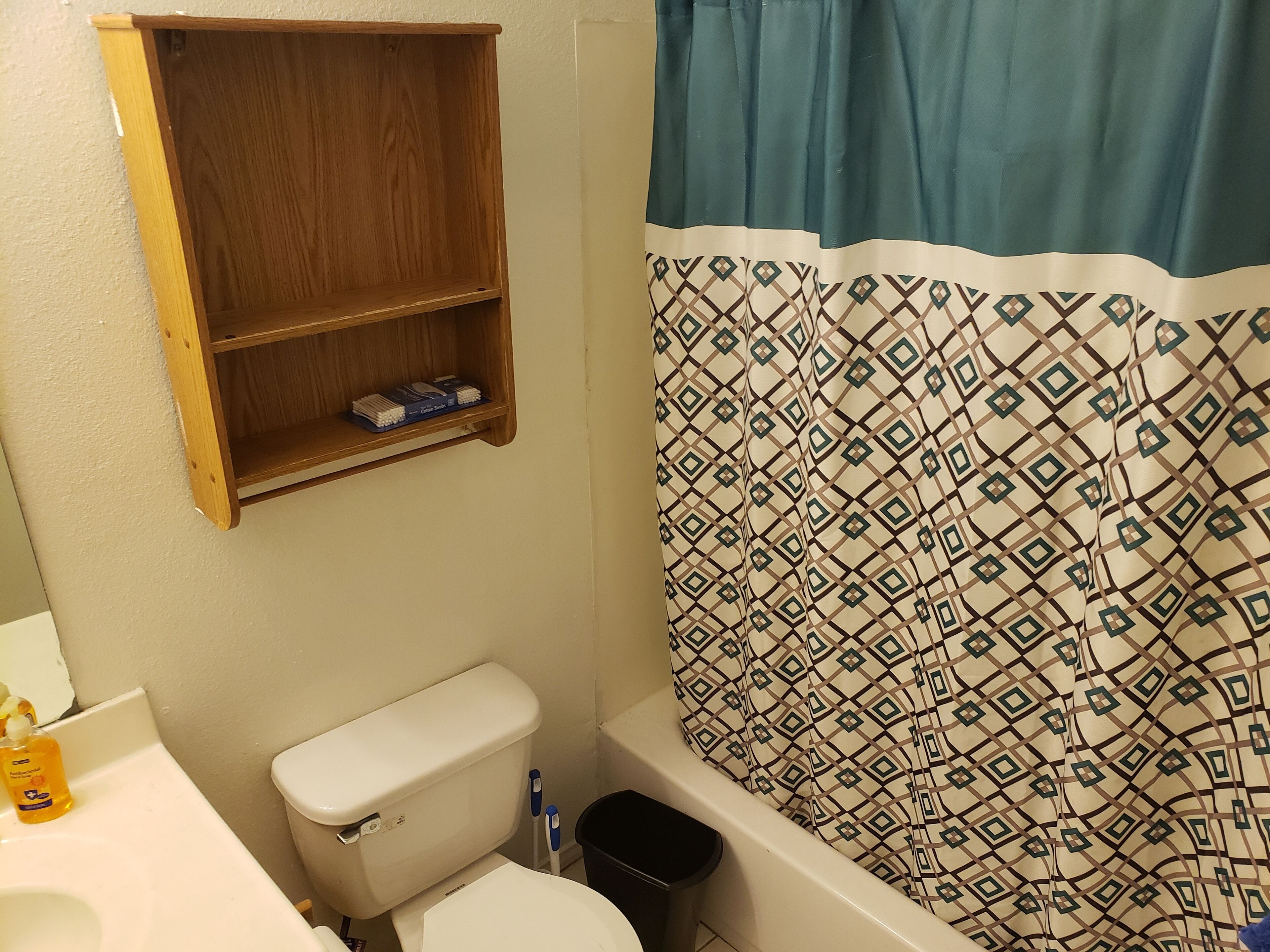 Bathtub, hair dryer, towels, soap