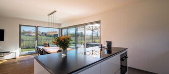 Luxurious design holiday home with mountain view, fireplace and garden