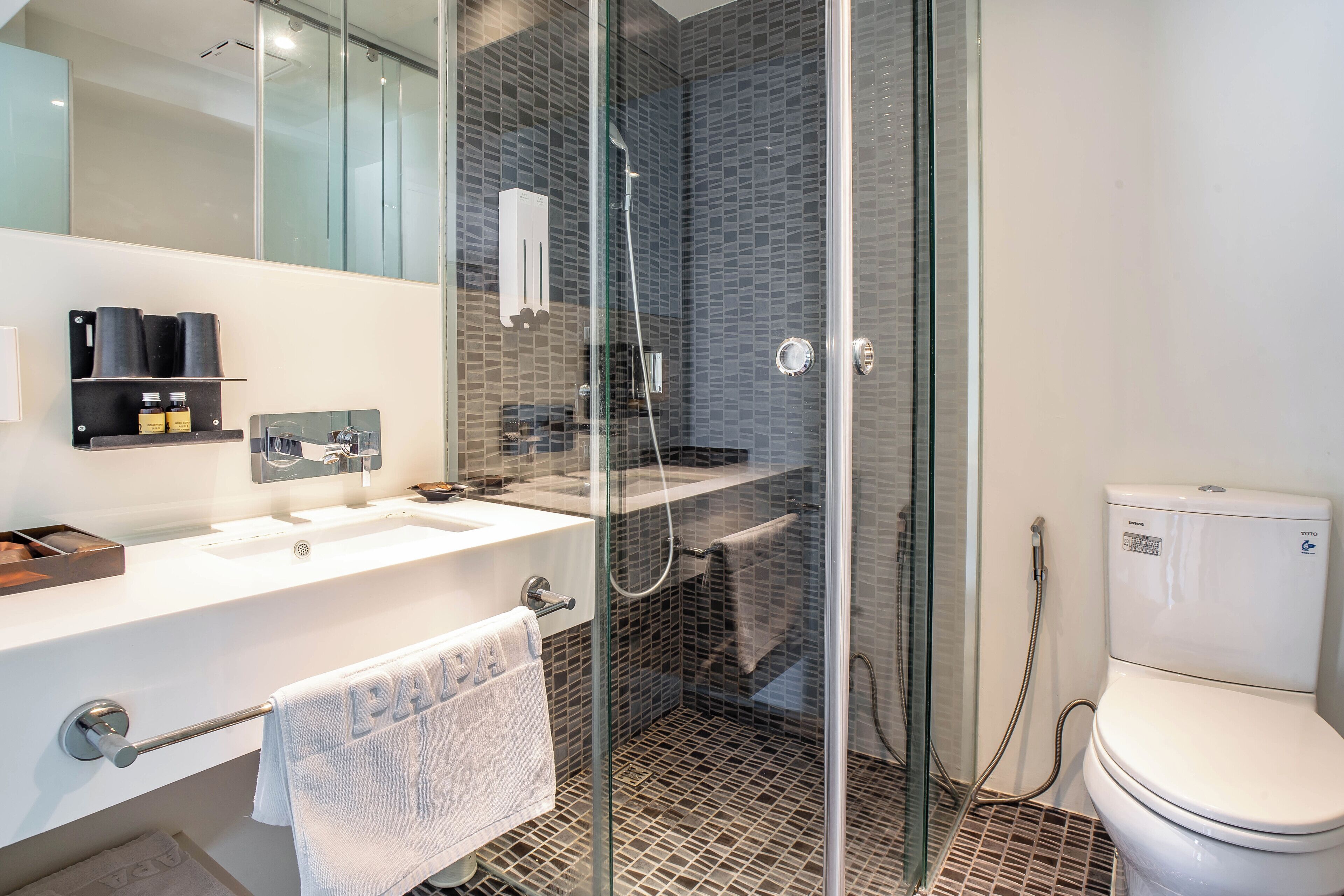 deluxe double room | bathroom | shower, hair dryer, slippers, towels