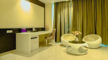 Presidential Suite | Minibar, desk, laptop workspace, iron/ironing board