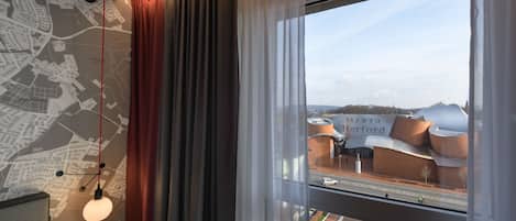 Hypo-allergenic bedding, in-room safe, desk, laptop workspace