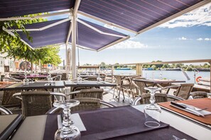 Lunch, dinner served; local cuisine, al fresco dining