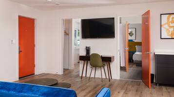 Family Double Room, Multiple Beds | Individually decorated, desk, laptop workspace, blackout curtains