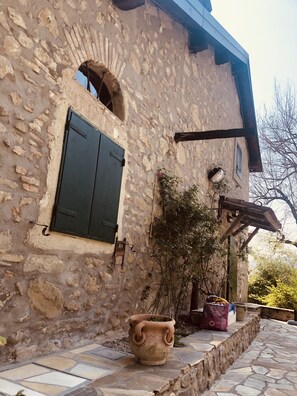Exterior detail - Old country house nestled in the green hills of Bologna (Marzabotto)