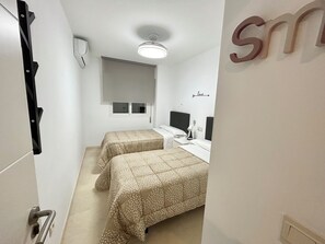 4 bedrooms, desk, iron/ironing board, travel crib