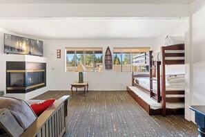 Grizzly Bear | Living area | 55-inch flat-screen TV with digital channels, streaming services - SoCal Vacations - Village Inn (Big Bear Lake)