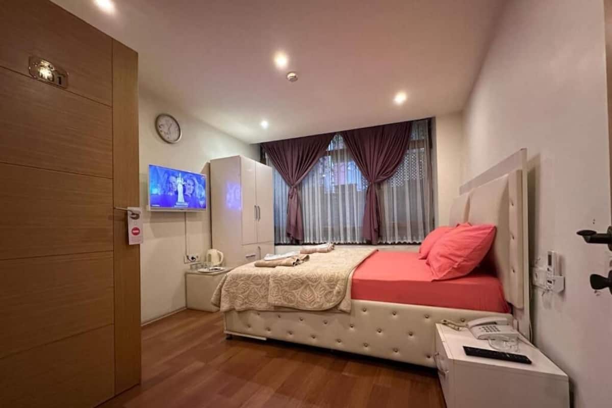 Economy Room | 1 bilik tidur, meja, Wi-fi percuma, cadar katil