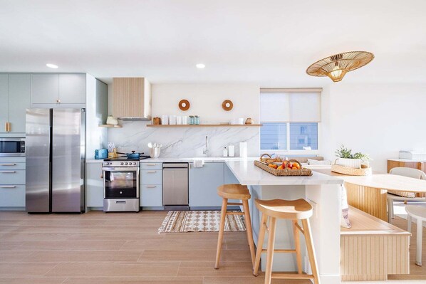Fridge, microwave, oven, stovetop - Beachfront Luxury, High end upper level cottage, North Coast Village A22 (Oceanside)